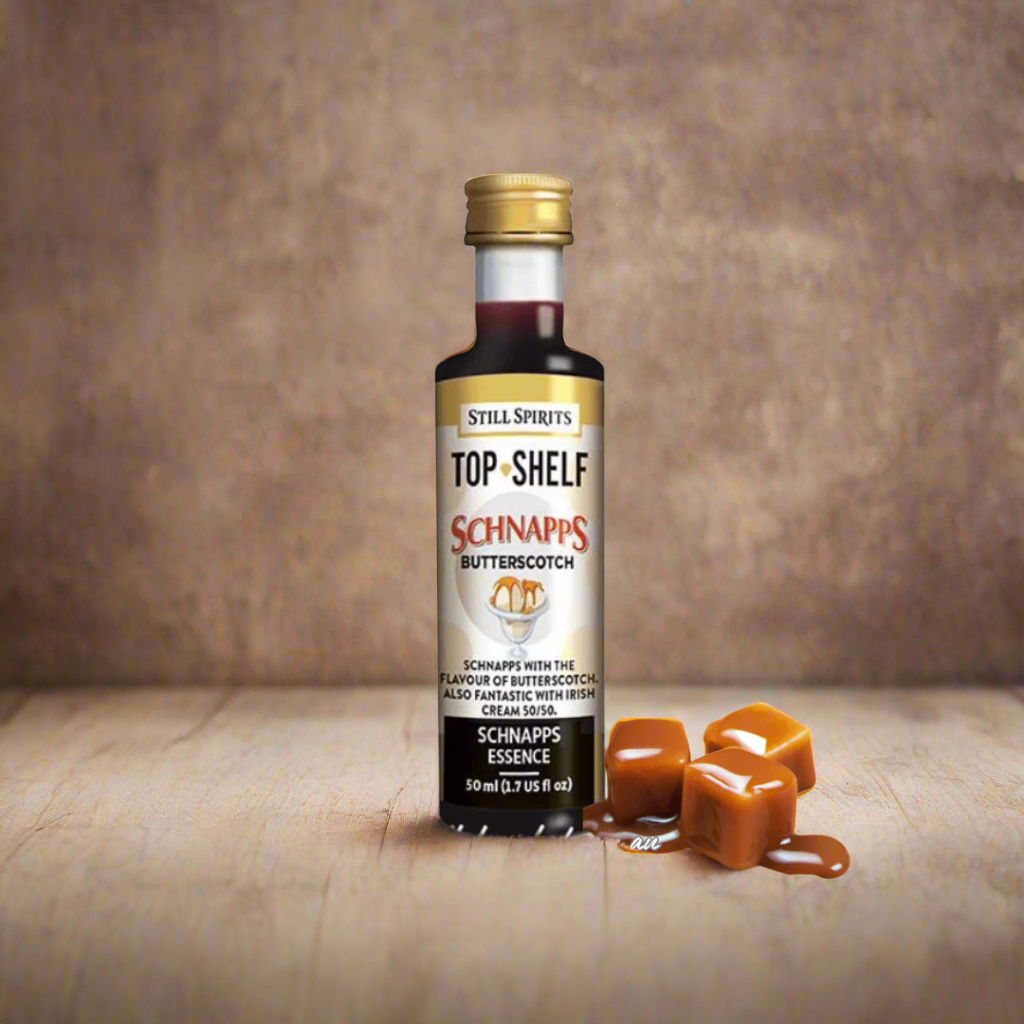 clear plastic bottle sits with butterscotch melting around it. Brown liquid fills the bottle