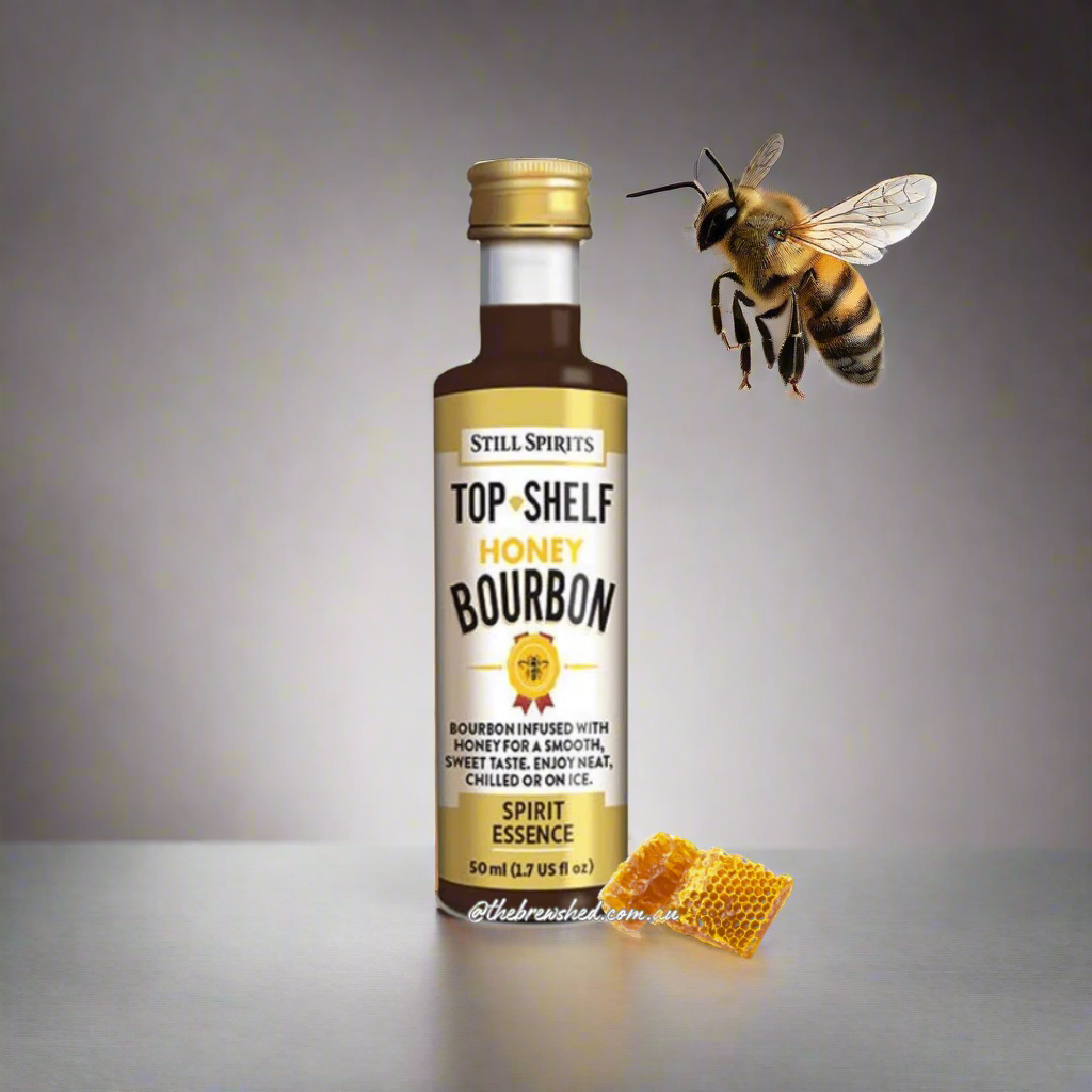 gold and white labelled bottle with dark liquid inside and honeycombe on the front