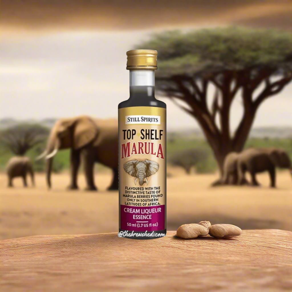 clear bottle with dark liquid inside and elephant on the front