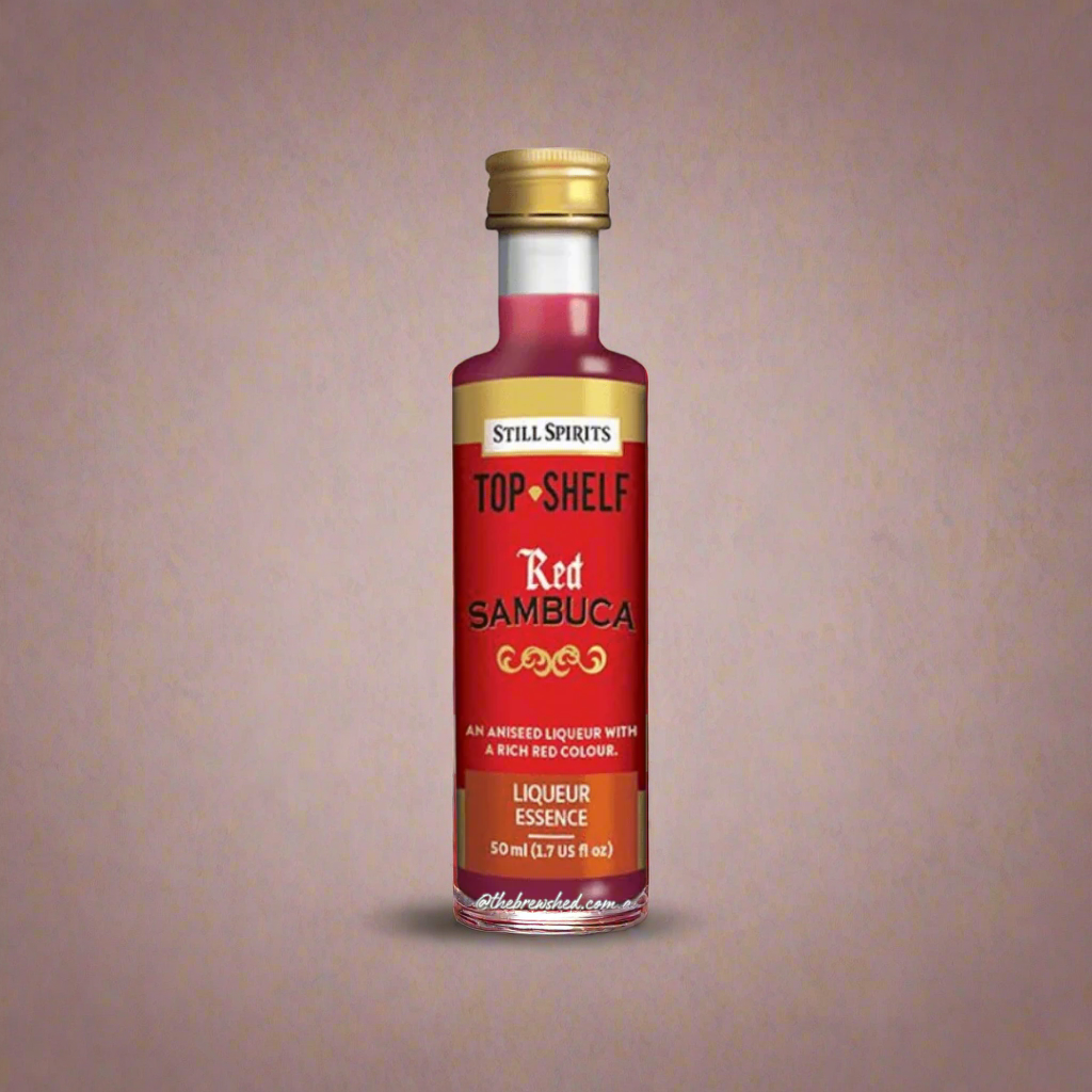 clear bottle with vibrant red liquid inside, red and gold label