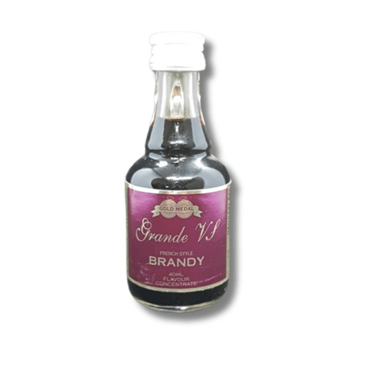 cute little glass bottle with dark coloured brandy spirit essence inside