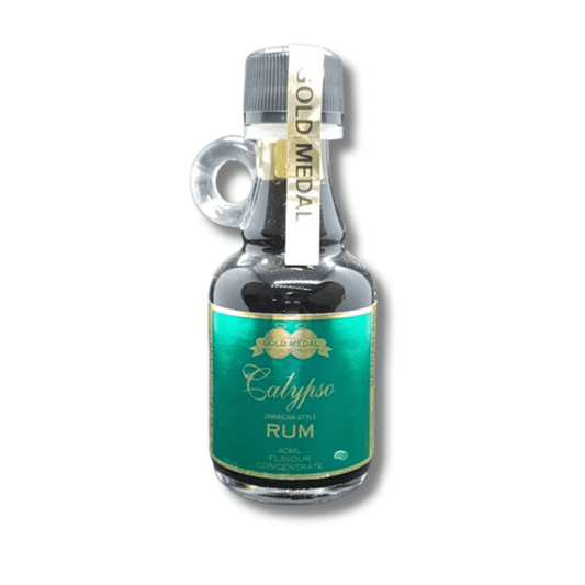 tiny glass bottle with cute handle filled with dark coloured Rum spirit essence