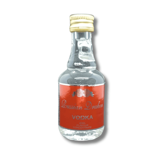 tiny glass bottle with cute handle filled with clear coloured vodka spirit essence