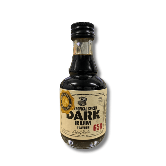 tiny glass bottle with dark coloured rum spirit essence inside