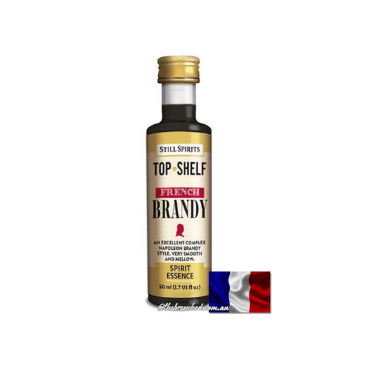 dark liquid in a clear bottle and a french flag