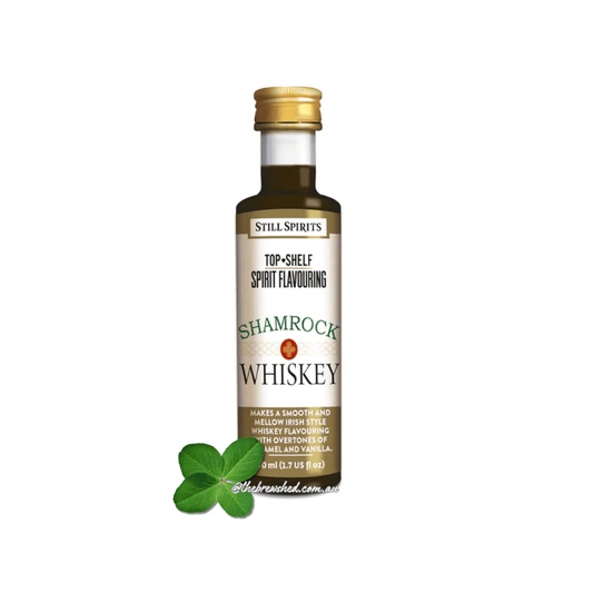 shamrock clover leaf next to a bottle with celtic symbold on the label
