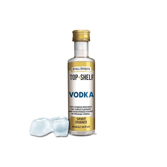 glacial coloured ice cubes next to a bottle with gold and white label